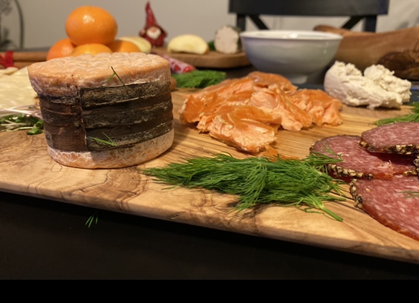 Adoray Salmon and Dill on Cheese Board Adoray on a charcuterie board with dill
